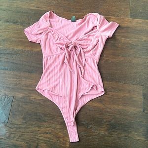 Pink bodysuit with a tie up from Wild Fable in size small